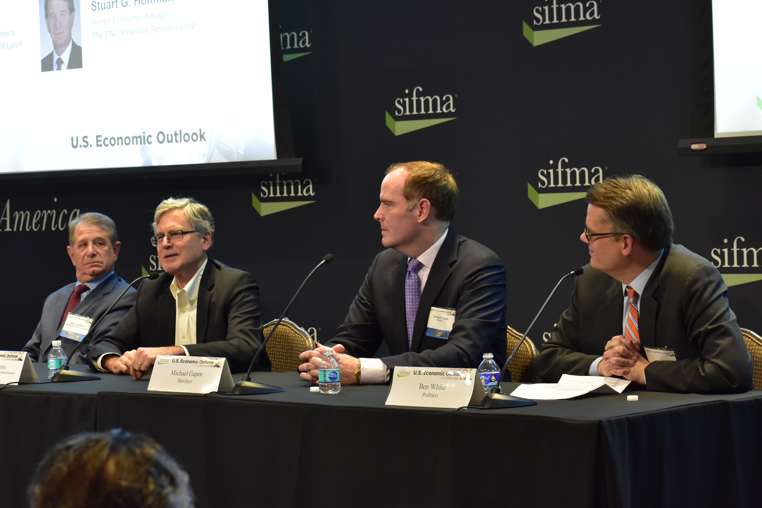 From left: Stuart Hoffman of The PNC Financial Services Group, Ethan Harris of BofA Merrill Lynch Global Research and Michael Gapen of Barclays with Ben White of Politico