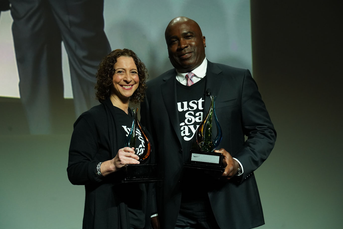 Chris Lewis and Jacqueline LiCalzi Accept the Inaugural SIFMA C&L Society DEI Advocate Award